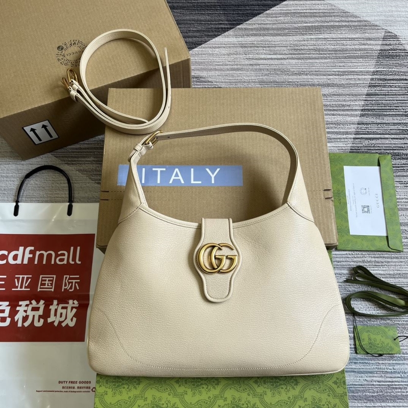 G*u*i top handle bags
